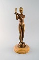 Unknown artist. Large bronze figure. Naked woman with child.

