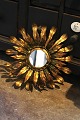 K&Co. presents: 
Decorative, 
old French sun 
mirror in brass 
with a very 
fine patina. 
Dia.: 37cm...