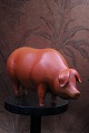 K&Co. presents: 
Decorative, 
old piggy bank 
in painted 
terracotta...