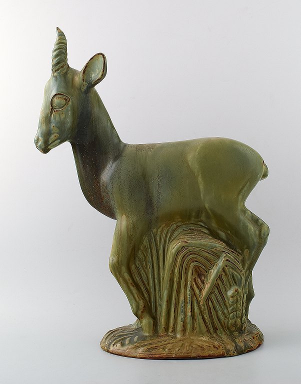 Large and impressive Axel Salto for Royal Copenhagen: A stoneware figure 
modelled in the shape of a deer.