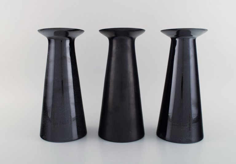 Stölzle-Oberglas, Austria. Three Beatrice and Nora vases in black art glass. 
White interior. 1980s.
