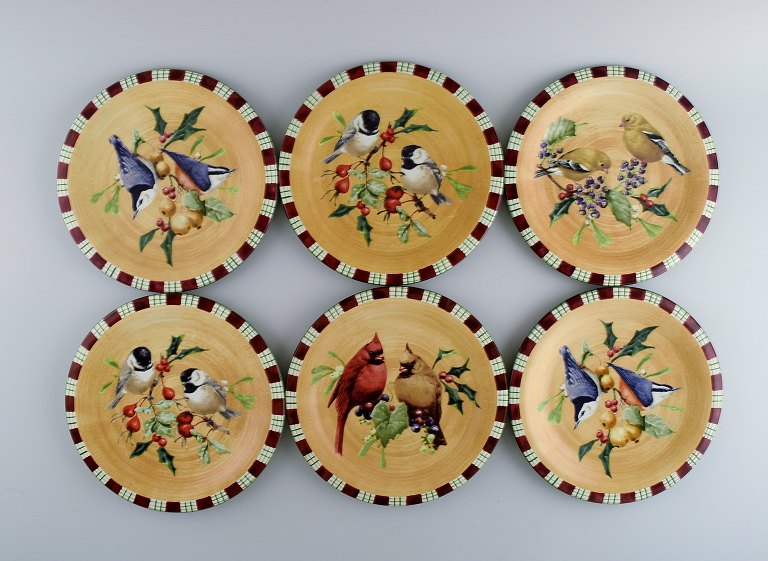 Catherine McClung for Lenox. "Winter greetings everyday". Six plates in glazed 
stoneware decorated with mistletoe and birds. Approx. 2000.
