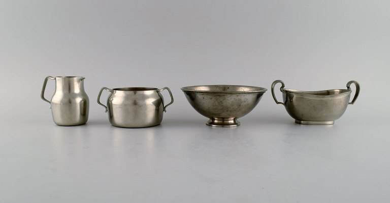 Just Andersen (1884-1943), Denmark. Art deco pewter creamer and three bowls. 
1940s.
