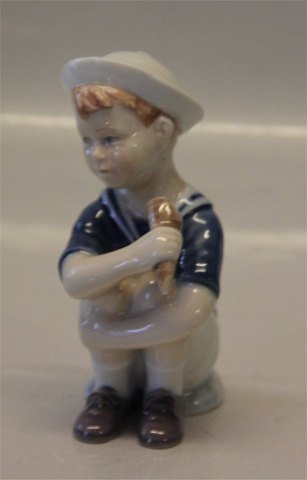 Royal Copenhagen figurine 
0680 RC Boy "Jens" with icecream 12 cm (2021680)
