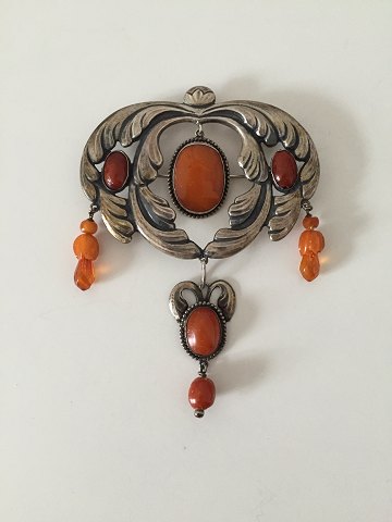 Art Nouvau one of kind jewelry piece with amber of unknown artist. From 
1910-1920.