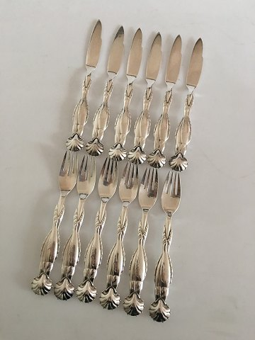 Georg Jensen "Ornamental" Fish Flatware No. 55 Knife and Fork for 6 People.