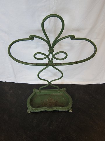 Umbrella stand which is practical and decorative at the same time
Beautiful old umbrella stand made of green painted iron with a beautiful shape 
and decorations
H.: 74cm, W: 39cm