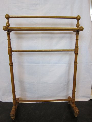 Stand, used for clothes, antique 
Dekorative and useful stand made of wood
About 1910
H: 97cm, W: 65cm, D. 27cm