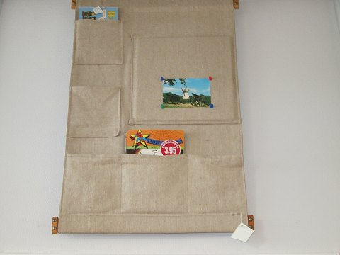 For the wall:
Hanger made of canvas, - this is true retro
Hanger made of canvas is with pockets as well as a little notice/bulletin board
There is a piece of wood in the top and the bottom and the hanger is made of 
leather
In a good condition