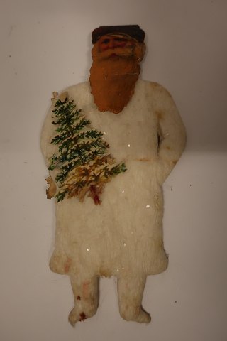 This old Christmas decoration is made of squeezed cotton wool and coloured 
scrap/cardboard
It has a fine old patina