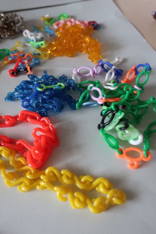 For the collector:
Old "Marking rings", - Toys, that is how you call this toy in Denmark, 
Made of plastic
There are items among these which are rare e.g.: Olympiade-logo, Bycycle,  Key 
and other
We played with these or we made a collection