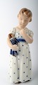 Royal Copenhagen figurine no. 3539. Girl with Doll. 
