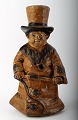 English figure in stoneware after Charles Dickens "Oliver Twist".