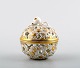 Herend lidded vase decorated with gold, porcelain.
