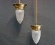 2 pendants in brass and in Jugendstil from 1930. The glass is from Funens 
glassworks and have been repaired. 
5000m2 showroom. 
