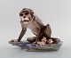 Rare Dahl Jensen. Monkey on stone, figure in porcelain, number 1086.
