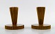 Tinos art deco, a pair of candlesticks in bronze.