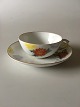 Royal Copenhagen No 93 White Half Laced w. Flowers and Gold Teacup and Saucer