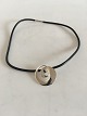 Georg Jensen Sterling Silver Torun Continuity Pendant No 2004 on chain made of 
black rubber material