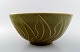 Christian Poulsen (1911-1991) Bing & Grondahl B & G Stoneware bowl decorated 
with celadon glaze and leaves.