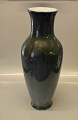 Klosterkælderen 
presents: 
Royal 
Copenhagen Vase 
Olive green 
crystal glaze 
ca. 42 cm 
Valdemar 
Engelhardt VE