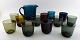 Kaj Franck (Finnish, 1911-1989) Nuutajärvi Glass Works, Finland, art glass. 12 
drinking glasses and a jug in different colors.