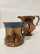 Lustre mug and lustre jug
H: 10,5cm (mug), 14cm (jug)
