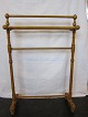 Stand, used for clothes, antique 
Dekorative and useful stand made of wood
About 1910
H: 97cm, W: 65cm, D. 27cm