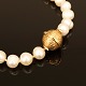 Per Borup: Pearl necklace with 14kt gold snap. D: 11mm
