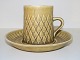 Relief
Coffee cup with saucer