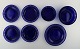 William Steberg for Gullaskuf. Seven plates and bowls in dark blue art glass.