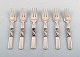 Georg Jensen. Cutlery, Scroll no. 22, hammered Sterling Silver consisting of: 6 
cake forks.