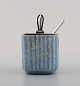 Michael Andersen, Denmark: Marmelade jar in ceramics, fluted style with plated 
silver lid and silver spoon by Hans Hansen.
