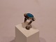 Ring with blue stone of 925 sterling silver.
5000m2 showroom.
