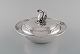 L'Art presents: 
Early and 
rare art 
nouveau Georg 
Jensen lidded 
bowl in 
hammered 
silver. knob in 
the form of ...