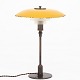 Roxy Klassik 
presents: 
Poul 
Henningsen / 
Louis Poulsen
PH 3,5/2 
bordlampe i 
bruneret 
messing med gul 
kobber ...