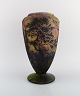 L'Art presents: 
Daum 
Nancy, France. 
Large vase in 
mouth blown art 
glass decorated 
with landscape 
with trees. ...