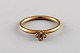 Scandinavian jeweler. Vintage ring in 8 carat gold adorned with four 
semi-precious stones. Mid-20th century.

