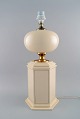 Le Dauphin, France. Large table lamp in cream lacquered metal and brass. 1970s.
