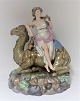 Lundin Antique 
presents: 
Royal 
Copenhagen. 
Porcelain 
figure. Woman 
on dromedary. 
From the series 
"The four ...