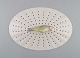Large Royal Copenhagen fauna danica/flora danica porcelain fish strainer modeled 
with hand-painted fish. Dated 1951.
