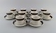 Hertha Bengtsson (1917-1993) for Rörstrand. 10 Koka coffee cups with saucers in 
glazed stoneware. 1960s.
