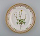 Royal Copenhagen Flora Danica lunch plate in hand-painted porcelain with flowers 
and gold decoration. Model number 20/3550.
