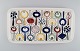 Marianne Westmann for Rörstrand. Large dish in hand-painted stoneware. Colorful 
Swedish design. 1950s.

