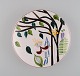 Stig Lindberg for Gustavsberg Studiohand. Round dish in glazed faience with 
hand-painted flowers. 1940s.
