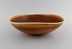 Berndt Friberg (1899-1981) for Gustavsberg Studiohand. Large bowl in glazed 
ceramics. Beautiful glaze in shades of brown. Dated 1966.

