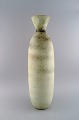 Carl Harry Ståhlane (1920-1990) for Rörstrand. Colossal vase in glazed ceramics. 
Beautiful glaze in light earth tones. Mid 20th century.
