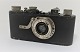 Lundin Antique 
presents: 
Leica. 
Early camera. 
No. 2224. 
Produced 1926.