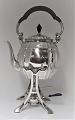 Lundin Antique 
presents: 
A. 
Halberstadt, 
Copenhagen. 
Silver tea 
kettle (830). 
Height 42 cm. 
Produced 1917