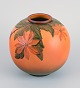 Ipsens, Denmark, round ceramic vase. Glaze in orange and green tones.